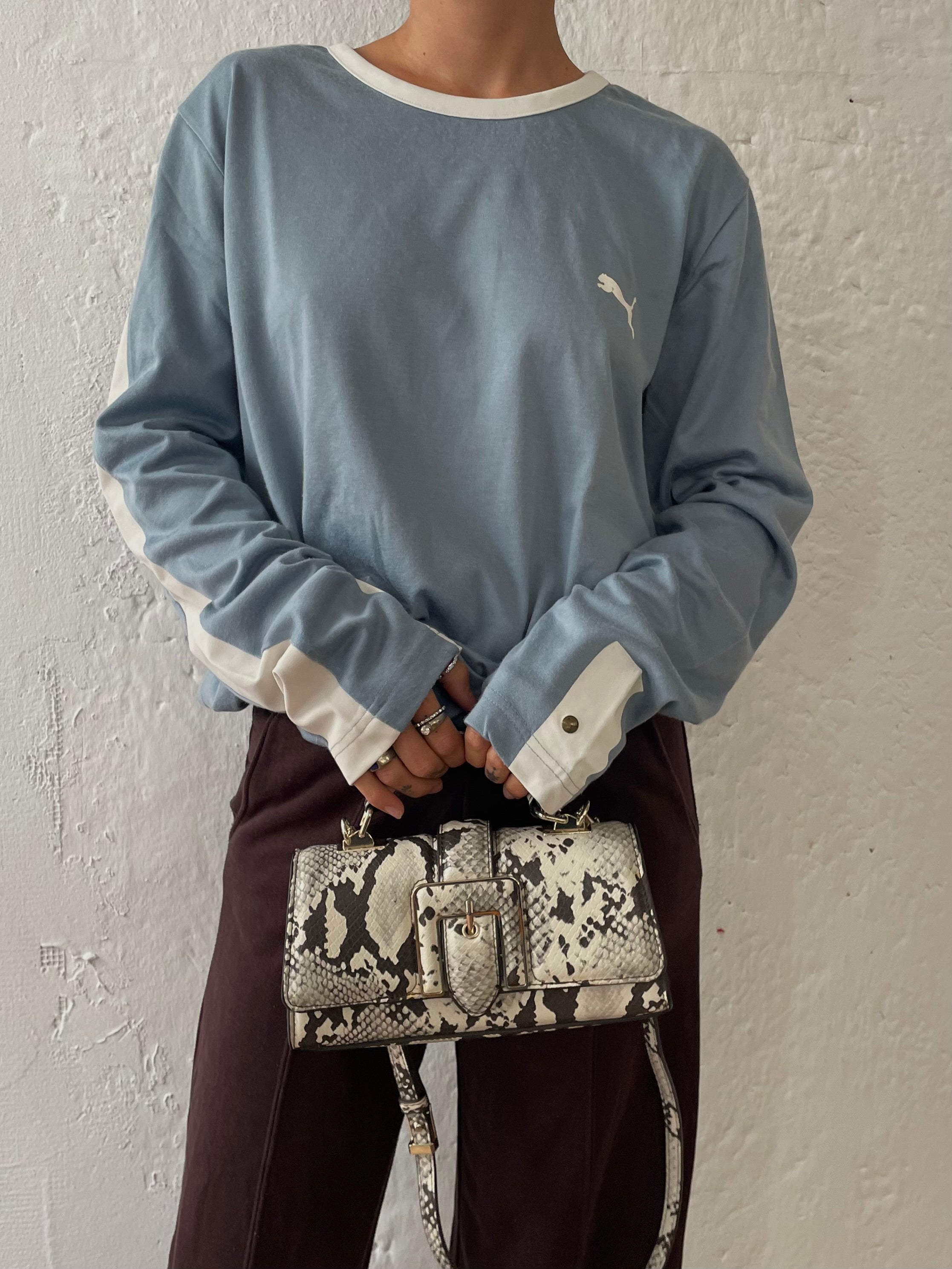 Schwarz/weiß gefleckte Tasche