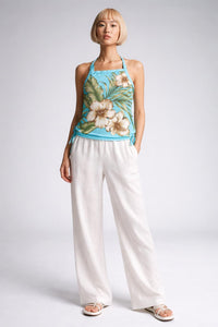 Full body view of the model wearing top